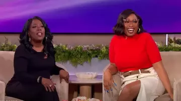 Donna Karan Cutout Sweater With Hardware Detail worn by Sheryl Underwood as seen in The Jennifer Hudson Show on May 14, 2025