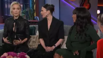 Schiaparelli Knitted Charm Sweater worn by Angela Bassett as seen in The Kelly Clarkson Show on May 22, 2025