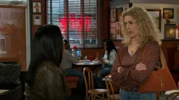 Hobo Joni Studded Bag worn by  Jan Morgan (Jerri Tubbs) as seen in Beyond the Gates (S01E51)