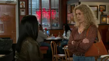 Hobo Joni Studded Bag worn by  Jan Morgan (Jerri Tubbs) as seen in Beyond the Gates (S01E51)