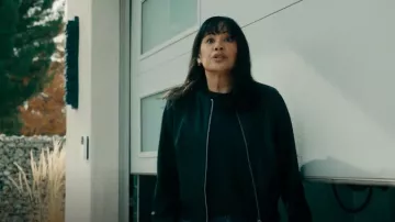 AllSaints Black Orten Bomber Jacket worn by Fiona De La Rosa (Martha Millan) as seen in The Cleaning Lady (S04E06)