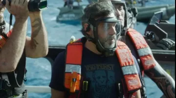 Void Tourist T-Shirt worn by Dr. Ian Garvin (Jemaine Clement) in Avatar: The Way of Water