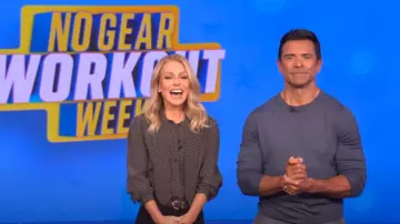 Saint Laurent Polka Dot Tie Neck Button Down Silk Blouse worn by Kelly Ripa as seen in LIVE with Kelly and Mark on May 28, 2025