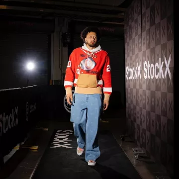 Martine Rose Blue Allover Restricted Symbol Jeans worn by Cade Cunningham on the Instagram account @detroitpistons