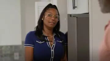 Alice + Olivia Marlena Button Front Polo worn by Angela Oakley as seen in The Real Housewives of Atlanta (S16E12)