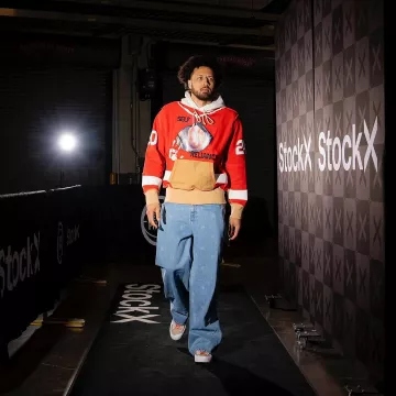 Advisory Board Crystals Red & Beige Eye Print Birthstone Hoodie worn by Cade Cunningham on the Instagram account @detroitpistons
