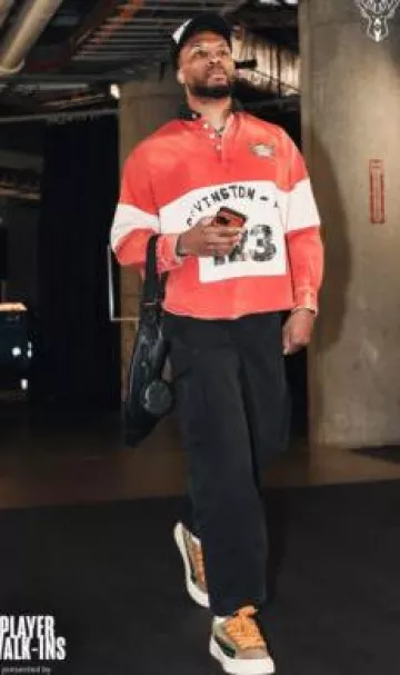 Louis Vuitton Black Monogram Leather Duo Sling Bag worn by Damian Lillard on the Instagram account @memgrizz