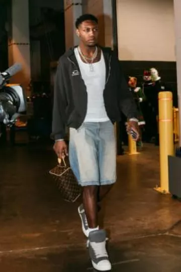 Louis Vuitton Brown Monogram Double Zip Toiletry Bag worn by R. J. Barrett on the Instagram account @raptors
