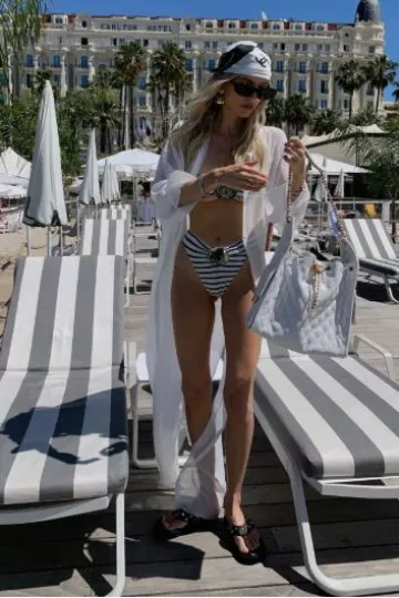 Chanel Charm Padded Pool Slides worn by Leonie Hanne on her Instagram Story on May 26, 2025