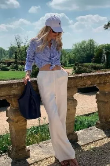 Polo Ralph Lauren Polo Play Leather Tote In Ink worn by  Leonie Hanne on her Instagram on May 28, 2025