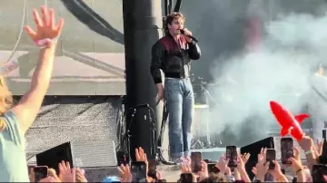 Benson Boone Bottlerock Napa Valley Bomber Jacket worn by Benson Boone in Benson Boone live at Bottlerock Napa 2025 - Sorry I'm Here For Someone Else, Slow It Down [4K HD]