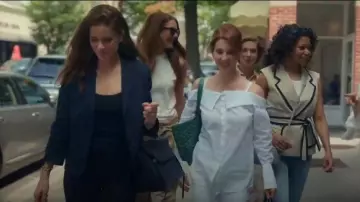 Celine Navy Blue Leather Top Handle Belt Bag. worn by Mel (Amanda Peet) as seen in Your Friends & Neighbors (S01E09)