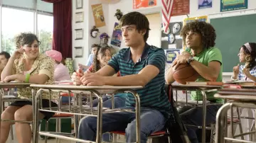 Striped polo worn by Troy Bolton (Zac Efron) in High School Musical 2