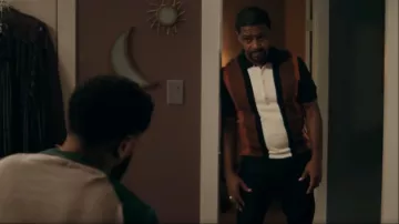 Ben Sherman Vertical Navy Stripe Knit Polo worn by Darnell (Rolando Boyce) as seen in The Chi (S06E09)