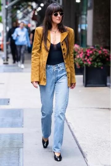 Khaite Colt Wedge in Black Glazed Leather worn by Dakota Johnson in New York City on May 30, 2025