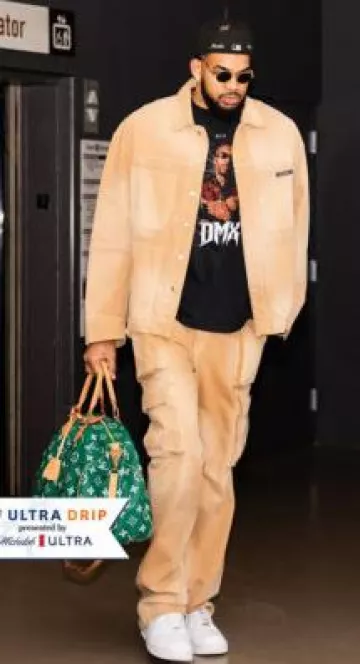 Veste de campagne en toile beige délavée Nahmias portée par Karl-Anthony Towns sur le compte Instagram @houstonrockets