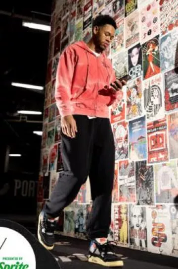 Gallery Dept. Red Sunfaded Logo Zip Hoodie worn by Anfernee Simons on the Instagram account @trailblazers