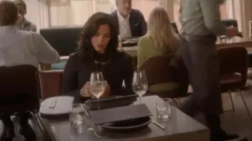 Versace Greca Goddess Clutch Bag worn by Seema Patel (Sarita Choudhury) as seen in And Just Like That… (S03E02)