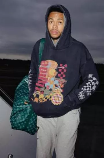 Louis Vuitton Green Heritage Monogram Keepall 50 Bag worn by Anfernee Simons on the Instagram account @trailblazers