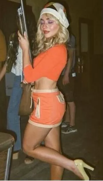 Dsquared2 Mini Skirt worn by Sabrina Carpenter at  Manchild Music Video post on June 6, 2025