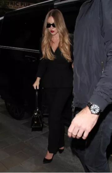Thom Browne Mrs Thom Triangle Bag worn by Sydney Sweeney in London on June 9, 2025