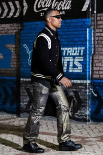 Jeans évasés Levi’s Gold Glitter 517 porté par Amon-Ra St. Brown sur le compte Instagram @nyjets