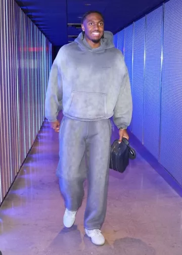 Alexander Wang Washed Grey Crystal Hoodie worn by Tyrese Maxey on the Instagram account @nbafashionfits
