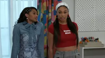 Forever 21 Dump Him Graphic Baby Tee worn by  Chelsea Hamilton(Rhonnirose Mantilla) as seen in Beyond the Gates (S01E73)