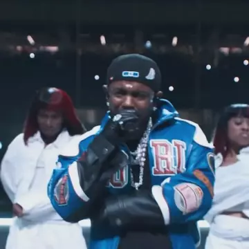 Super Bowl Halftime Show Kendrick Lamar Blue Leather Jacket worn by Kendrick Lamar on the Instagram account @nfl