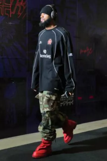 Balenciaga Black #10 Long Sleeve Soccer Jersey worn by Rashod Bateman on the Instagram account @ravens