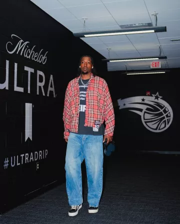 RRR-123 Red Flannel Nazarene Shirt worn by Kentavious Caldwell-Pope on the Instagram account @orlandomagic