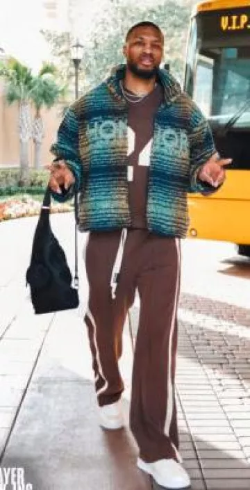 Nahmias Brown & White-Stripe Heavy Trackpants worn by Damian Lillard on the Instagram account @bucks