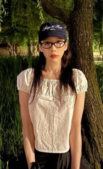 Sporty & Rich Syracuse Hat worn by Taeyeon on her Instagram post on June 12, 2025