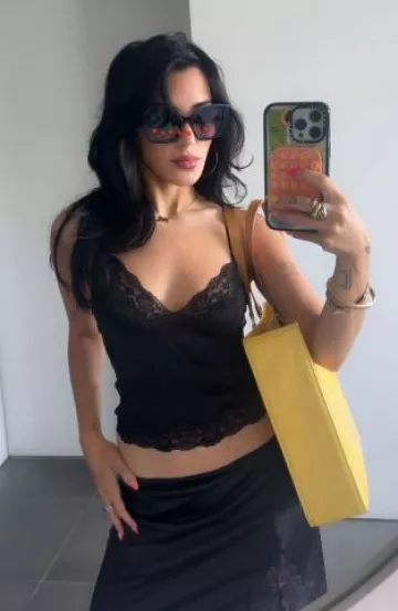 Louis Vuitton Tote Bag worn by Niki DeMartino on her Instagram Story post on June 12, 2025