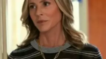 The Waterfront Maria Bello Striped T-Shirt of Mae Buckley (Maria Bello) in The Waterfront (S01E01)