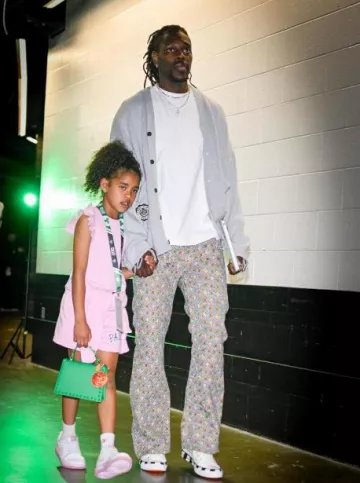 Honor The Gift Pantalon évasé multicolore rétro à imprimé diamant porté par Jrue Holiday sur le compte Instagram @celtics