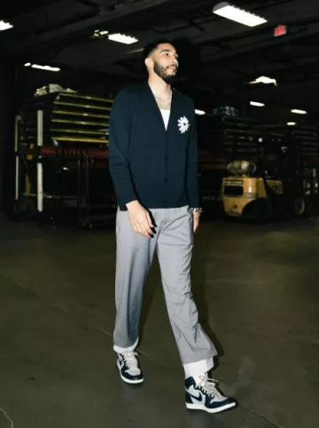 Kidsuper Studios Grey Layered Stripe Cuff Pants worn by Jayson Tatum on the Instagram account @leaguefits