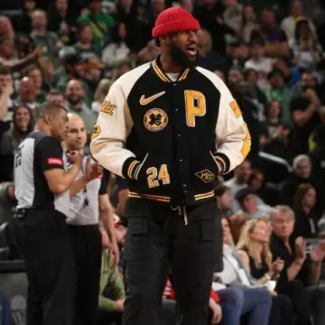 Nike x Patta Black, White, & Yellow Varsity Jacket worn by LeBron James on the Instagram account @leaguefits