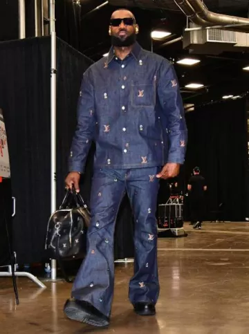 Louis Vuitton Black Allover LV Logo Alma Bag worn by LeBron James on the Instagram account @lakers