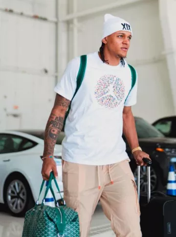 Jordan White & Multicolor Speckled Poolside T-Shirt worn by Paolo Banchero on the Instagram account @orlandomagic