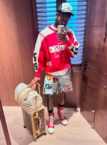 Louis Vuitton X Tyler The Creator Cream Keepall 45 Bag worn by JuJu Smith-Schuster on the Instagram account @juju