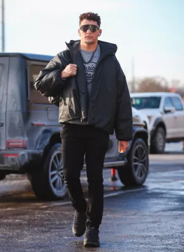 Moncler Adidas Black 'NMD Runner' Sneakers worn by Patrick Mahomes II on the Instagram account @chiefs