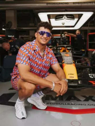 Versace White & Grey Trigreca Sneakers worn by Patrick Mahomes II on the Instagram account @patrickmahomes