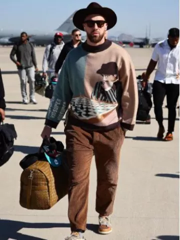 Bottega Veneta Light Brown Intrecciato Duffle Bag worn by Travis Kelce on the Instagram account @killatrav