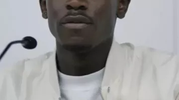 F1 Joshua Pearce White Bomber Jacket worn by Joshua 'Noah' Pearce (Damson Idris) in F1 The Movie