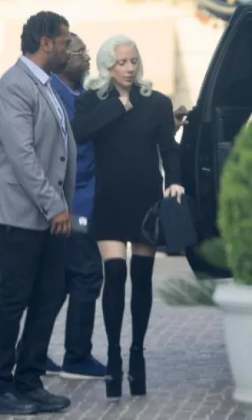 Norma Kamali Os Ls Shoulder Pad Zip Front Mini Dress worn by Lady Gaga in Beverly Hills post on June 13, 2025