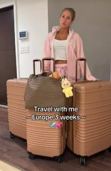 Beise Medium Check-In Roller worn by Alix Earle on her Tik Tok post on June 14, 2025