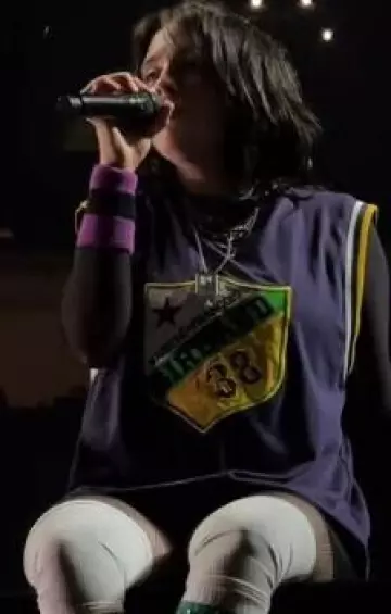 Retro 3 Stripe Tube Socks worn by Billie Eilish at Hit Me Hard and Soft Tour Barcelona Night 2 post on June 15, 2025