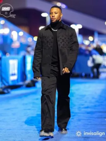 Louis Vuitton Black Flocked Monogram Pocket Pants worn by Saquon Barkley on the Instagram account @nygiants