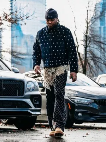 Louis Vuitton Deep Indigo Bleached Monogram Jeans worn by Derrick Henry on the Instagram account @titans